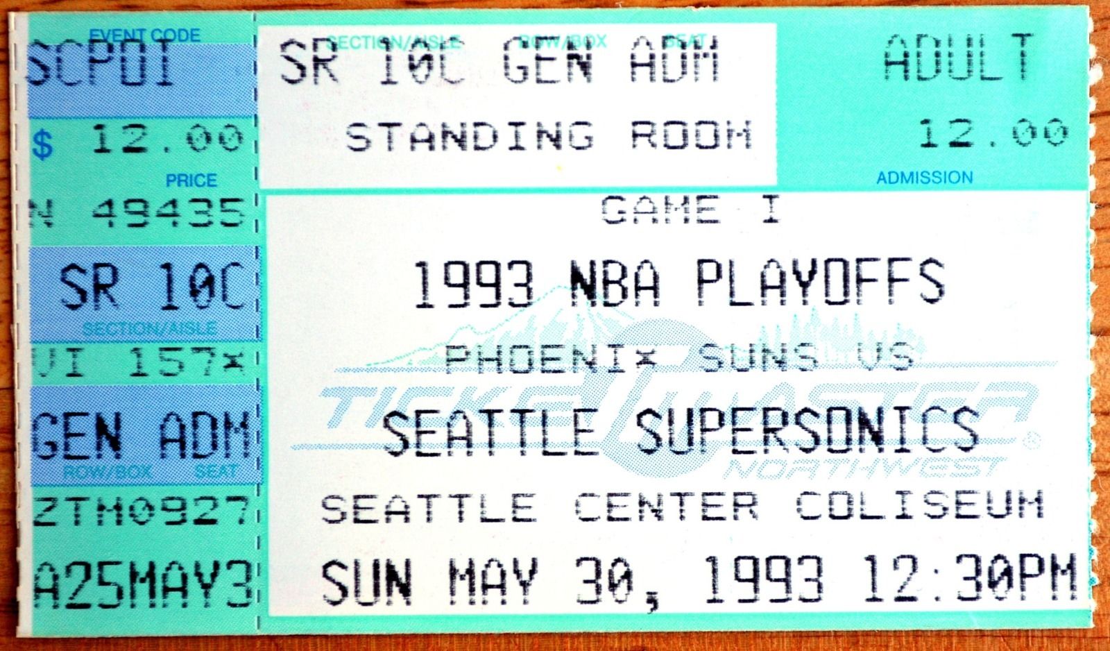 A basketball court with the Phoenix Suns logo at center court.