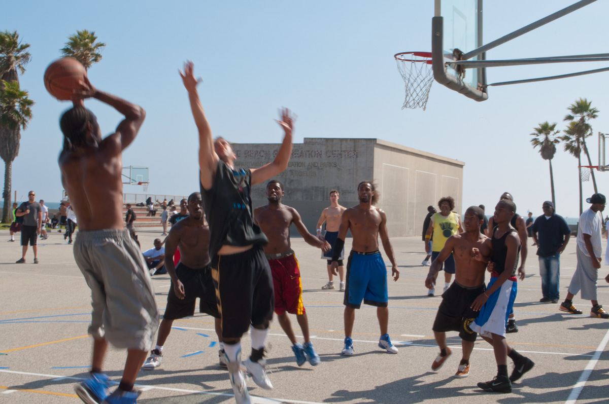 NBA players competing on the court during a close game.