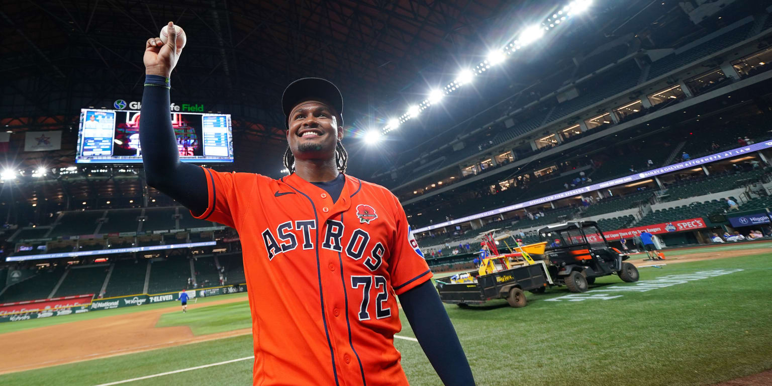 Houston Astros players celebrating after completing a no-hitter game.