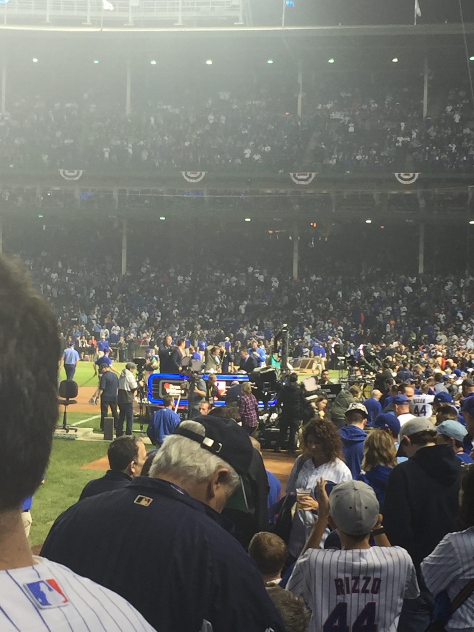 Baseball players in action during a San Diego Padres vs. New York Mets game.