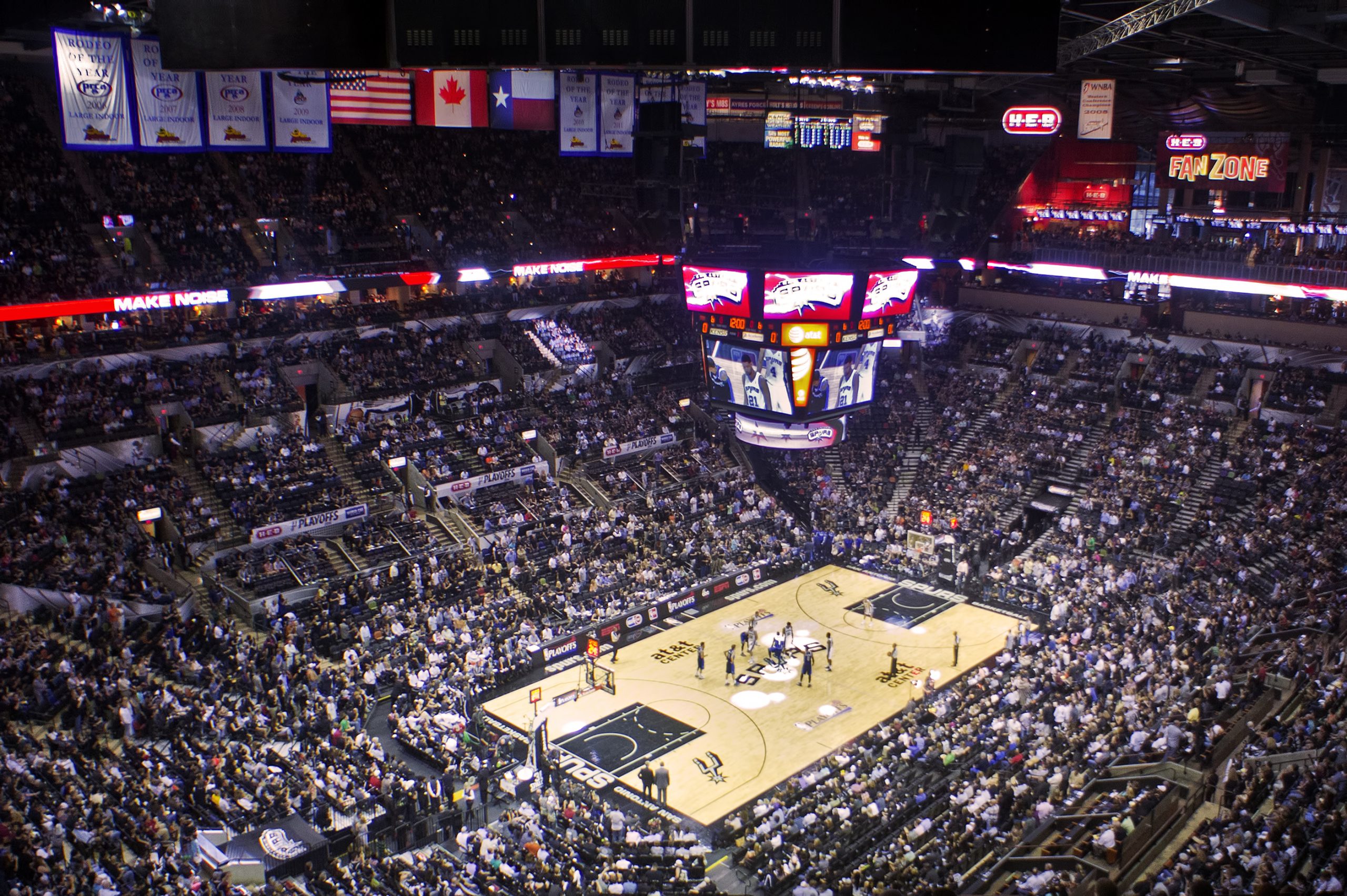 An NBA basketball on a court with playoff bracket graphics overlaid.