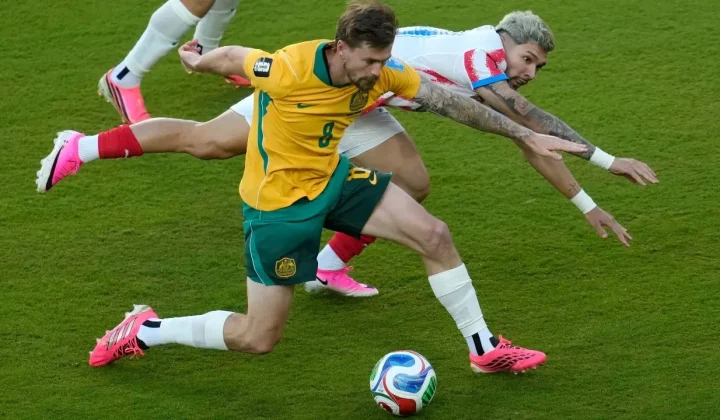 Australia Secures Knockout Berth in Goalless Draw Against Paraguay
