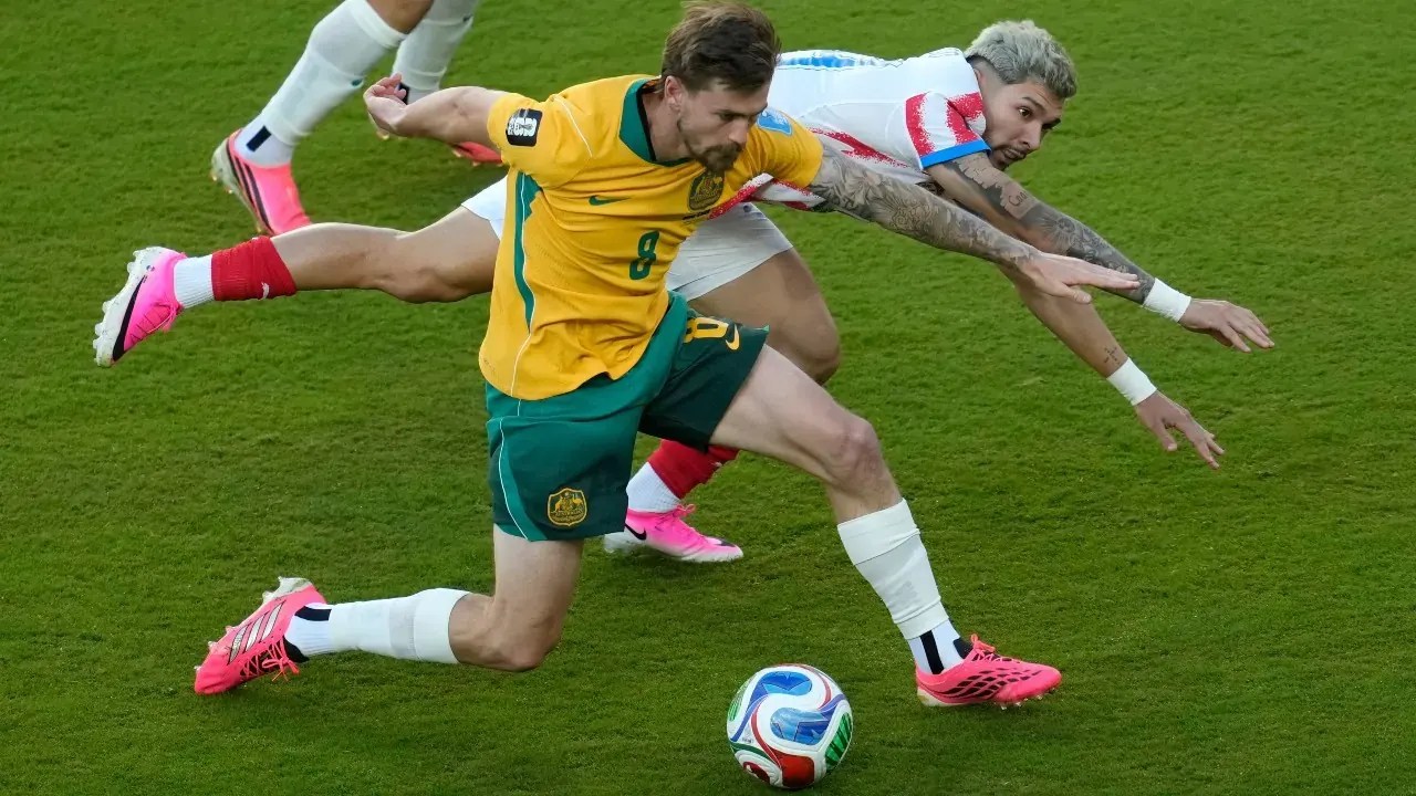 Australia Secures Knockout Berth in Goalless Draw Against Paraguay