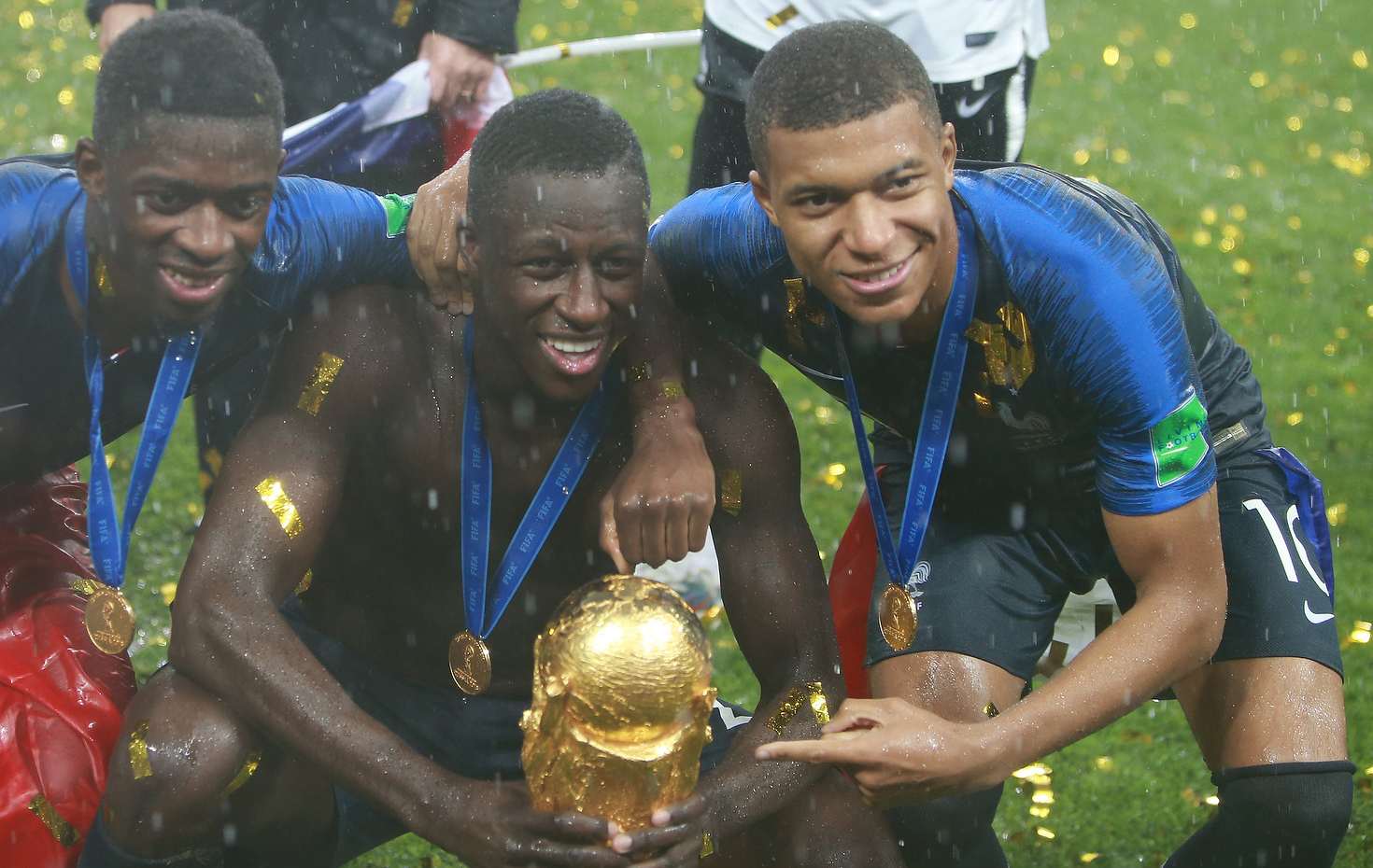 Kylian Mbappé in action on a football pitch