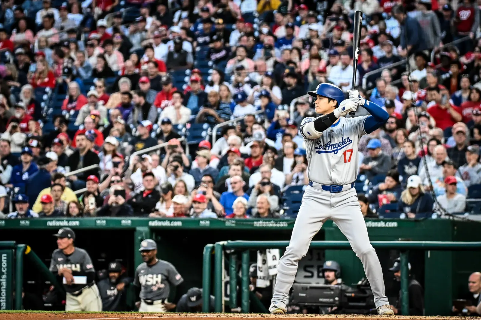 Los Angeles Dodgers' Shohei Ohtani on the pitcher's mound, showing determination.