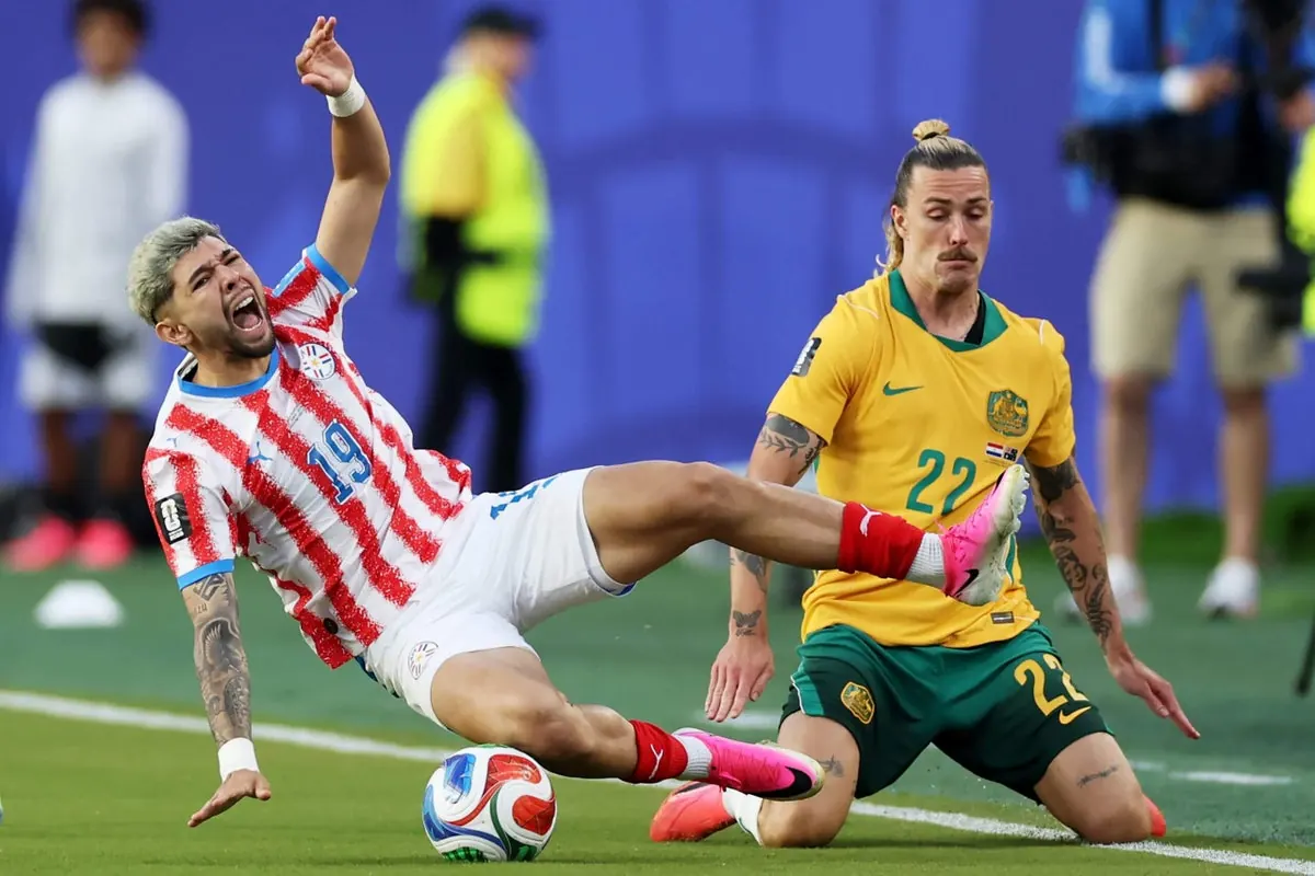 Players from Paraguay and Australia compete for the ball during their FIFA World Cup 2026 group stage match.