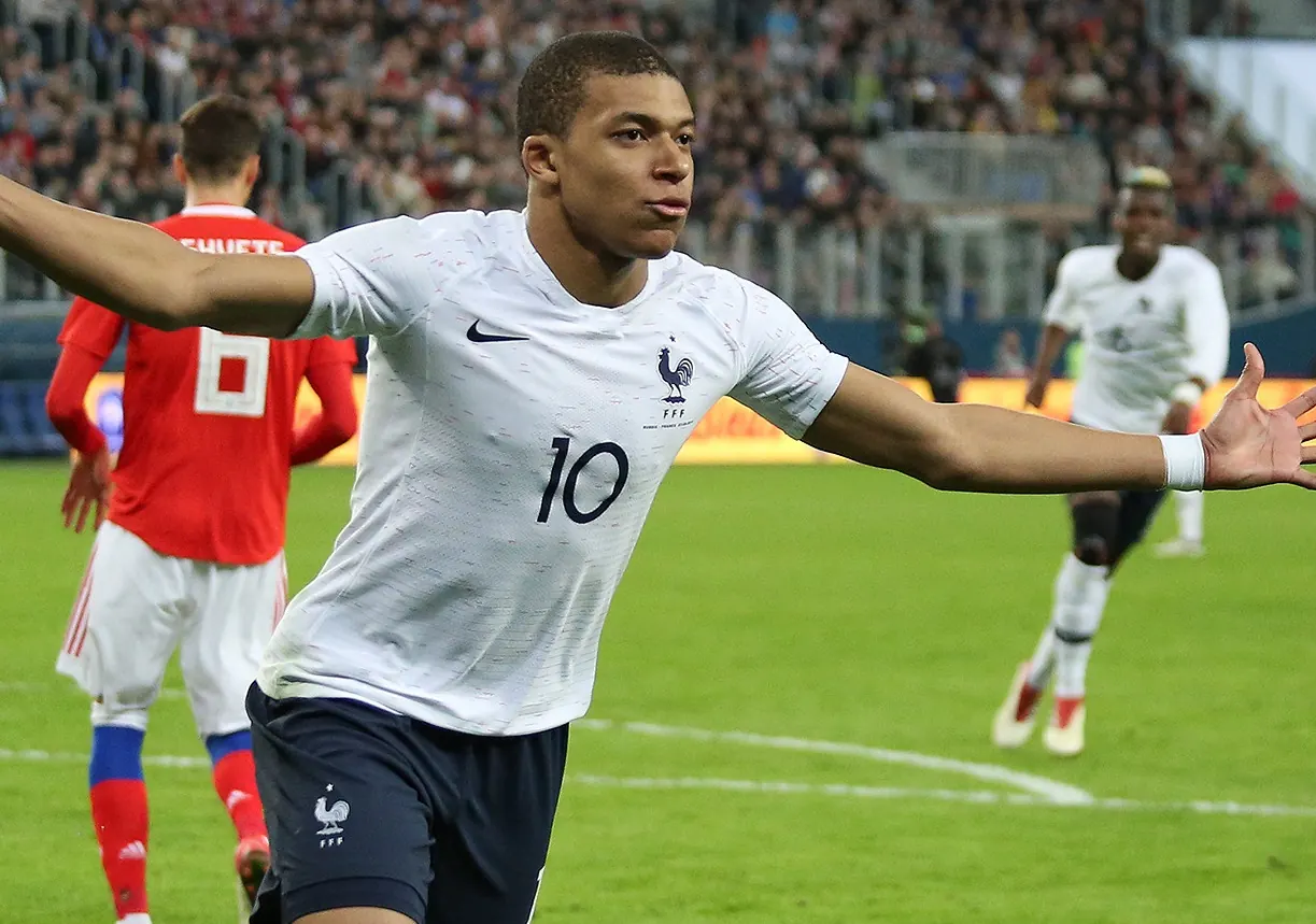 Kylian Mbappe in action for France, Erling Haaland in action for Norway, FIFA World Cup 2026 trophy, Adidas 'Trionda' football