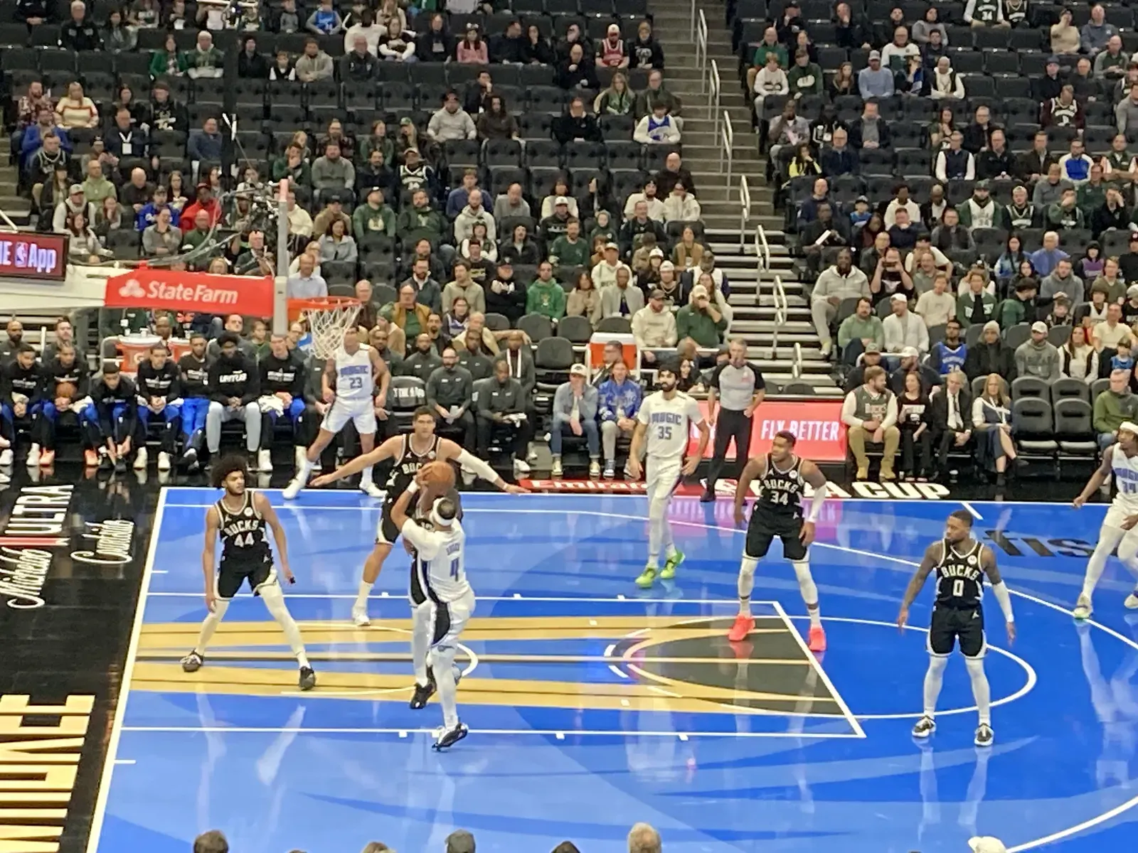 Basketball players in action during an NBA game.