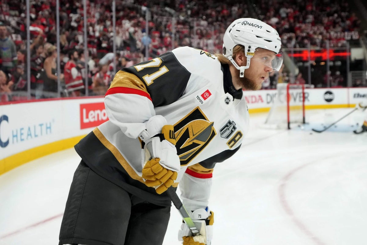 Vegas Golden Knights player William Karlsson appears to be in pain after an injury during a hockey game.