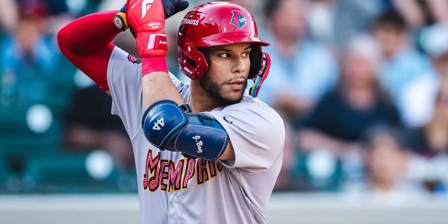 Joshua Báez swings a baseball bat during a game.