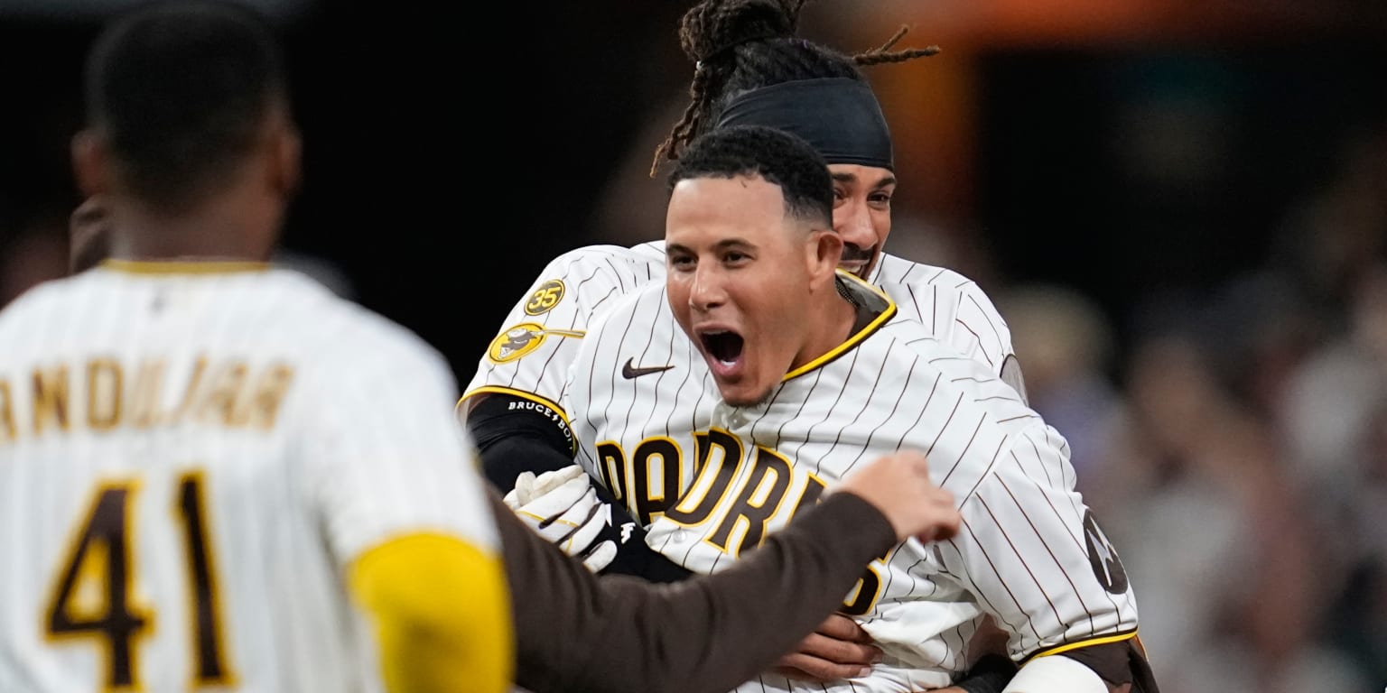 Manny Machado of the San Diego Padres rounding the bases after hitting a walk-off single.