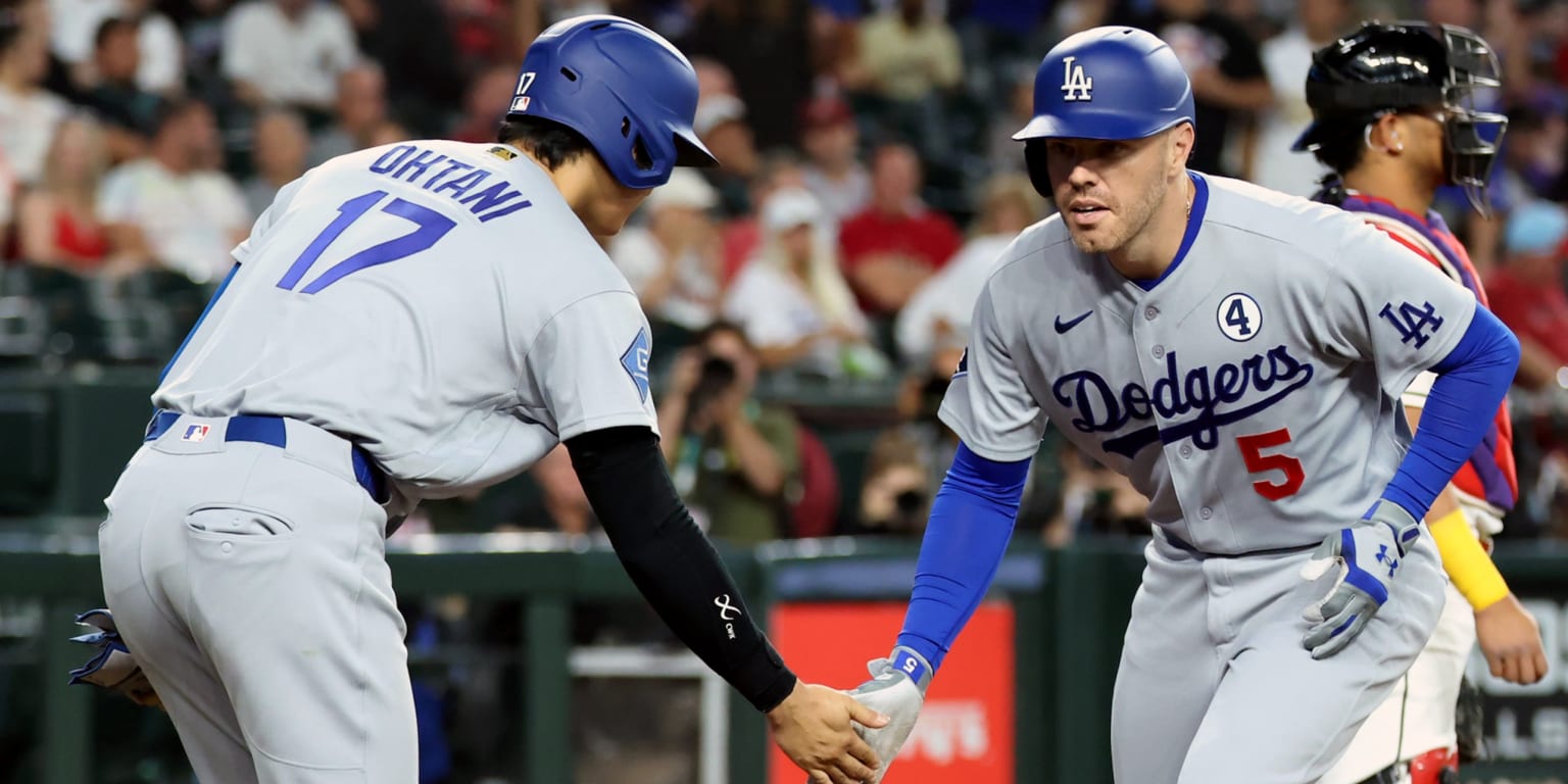 Shohei Ohtani in a Los Angeles Dodgers uniform during a baseball game.