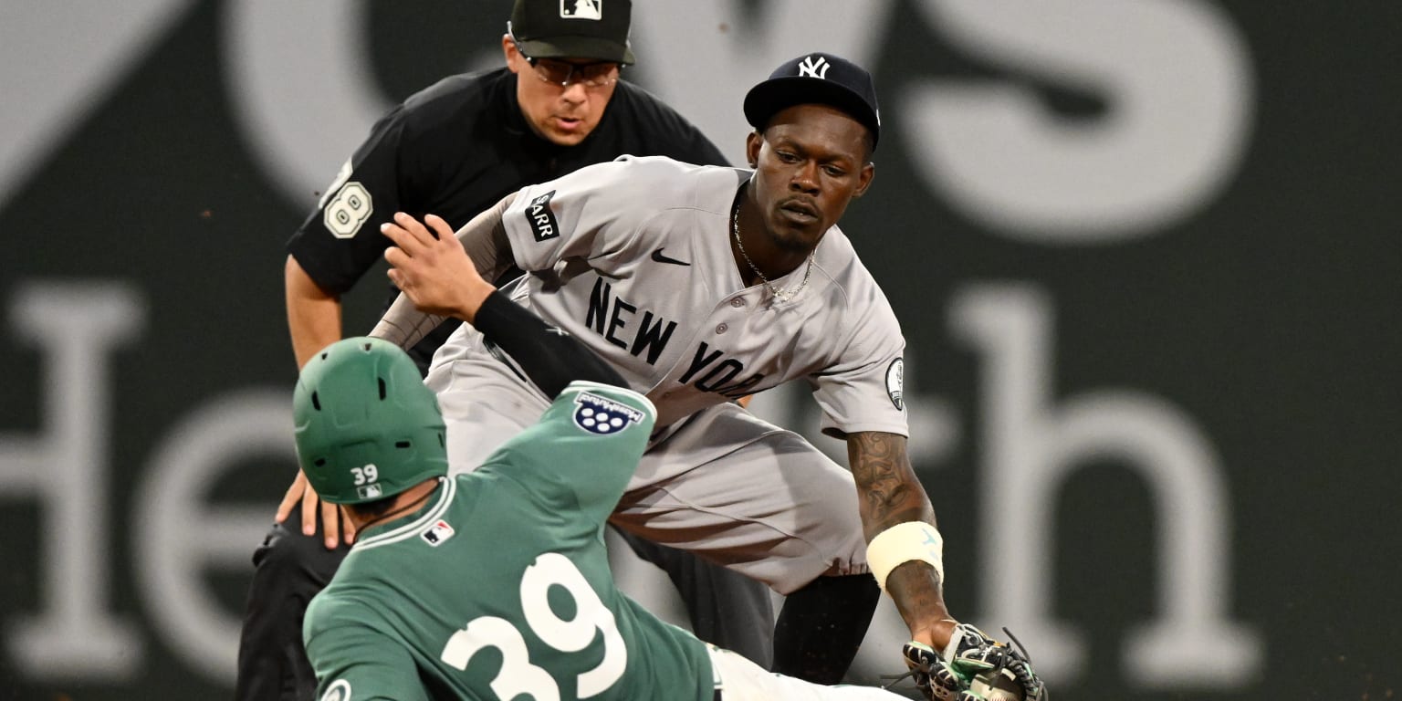 A baseball game between the Boston Red Sox and New York Yankees at Fenway Park.
