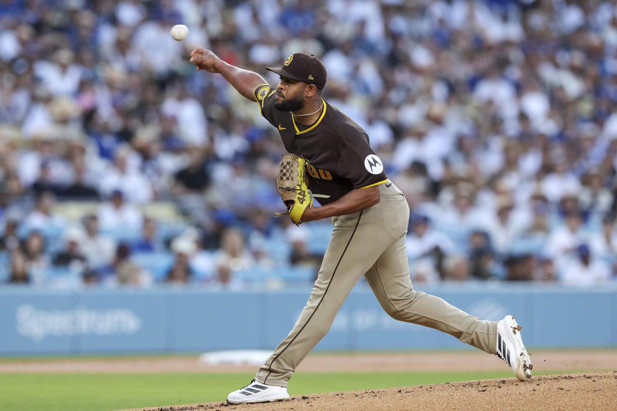 San Diego Padres pitcher Randy Vásquez in uniform on the field.