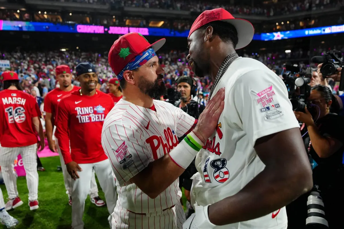 Jordan Walker celebrating his Home Run Derby victory on the field at Citizens Bank Park.
