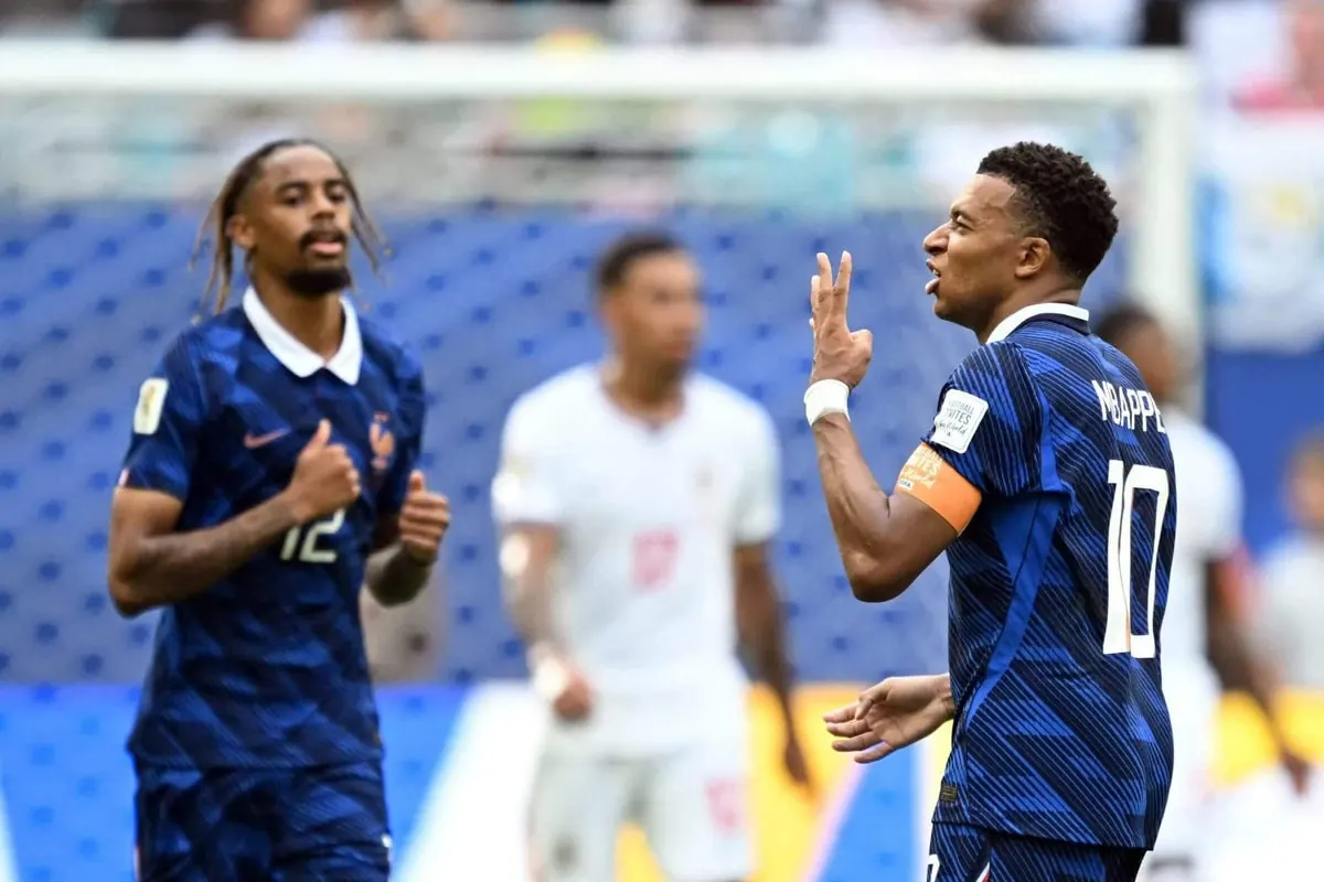 Kylian Mbappe celebrates scoring a goal during the FIFA World Cup third-place play-off match between France and England.