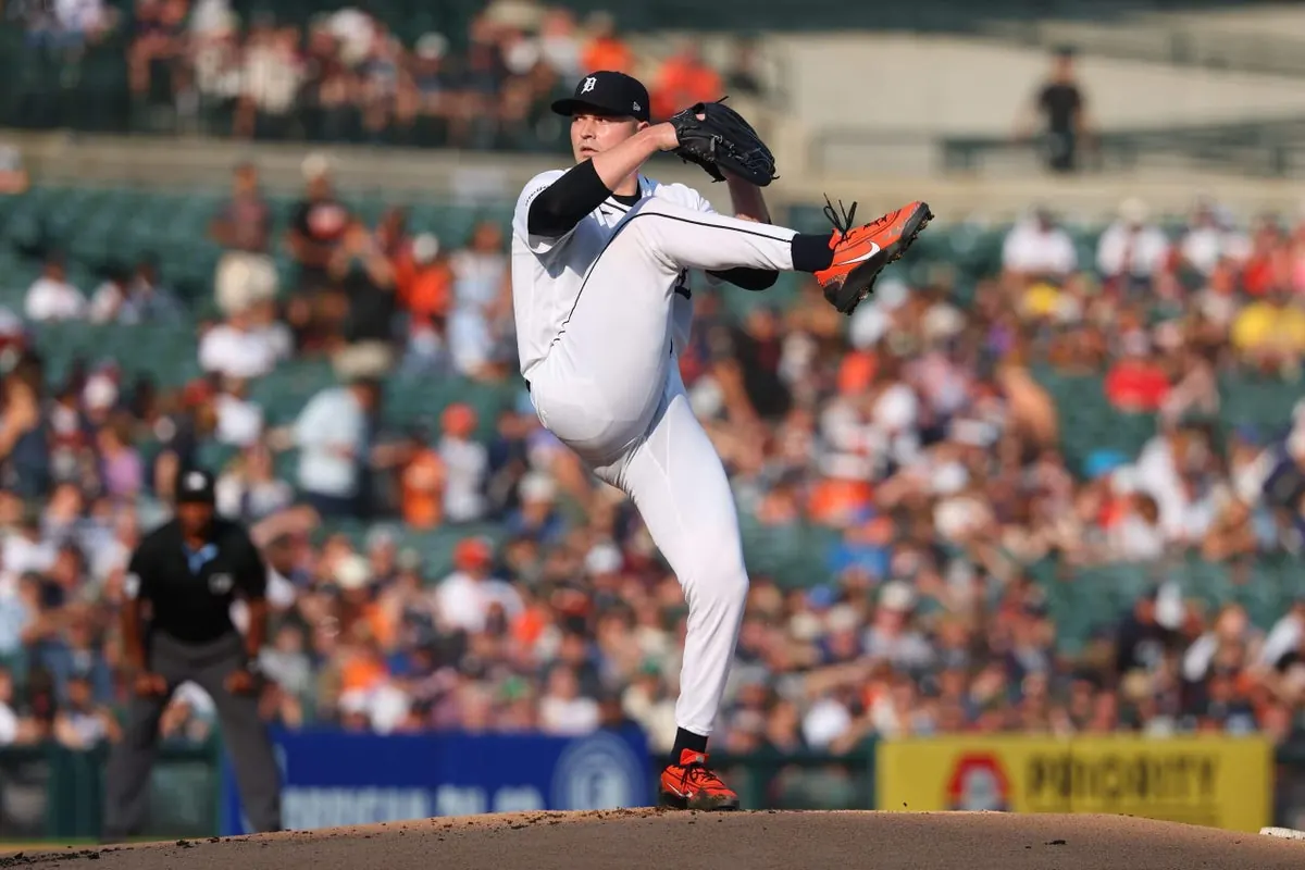 Tarik Skubal on the mound for the Detroit Tigers, mid-pitch during a game.