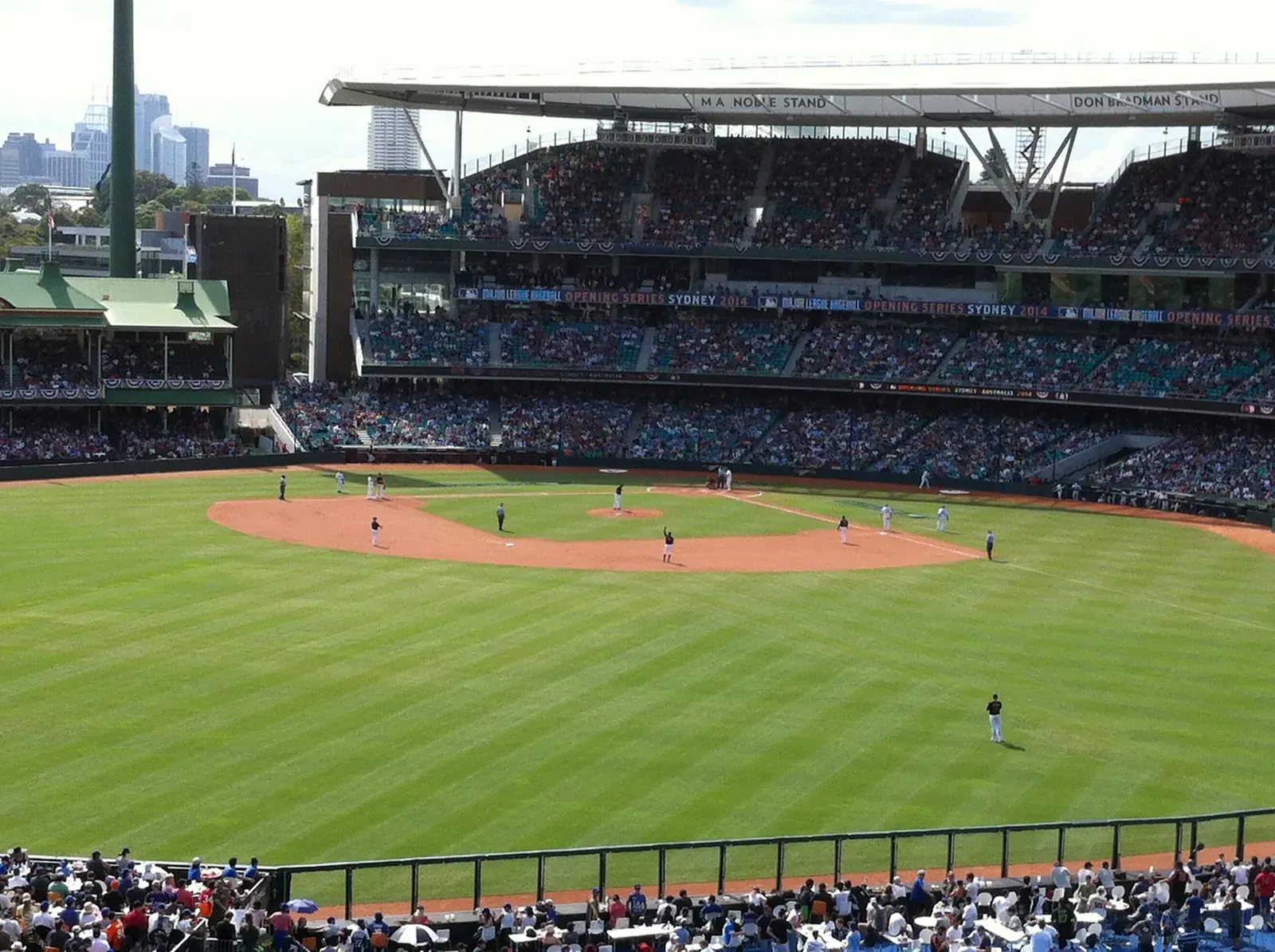 James McCann of the Arizona Diamondbacks hitting a home run during a game against the Los Angeles Dodgers.