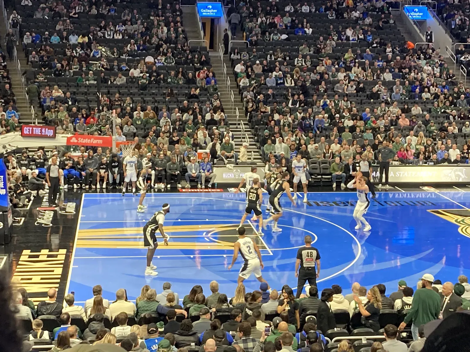 NBA players in action during a basketball game.