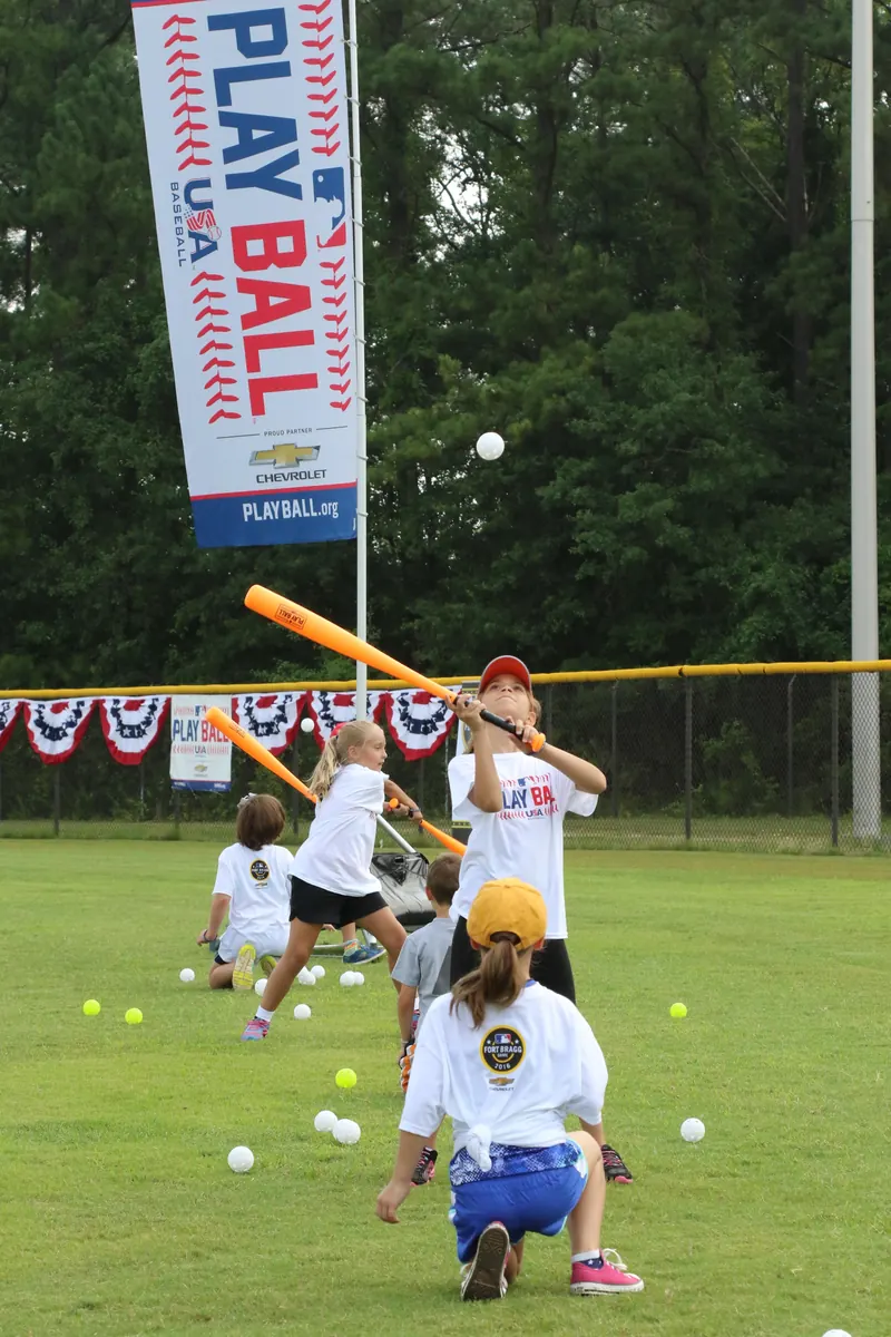 A baseball player swings a bat during an MLB game.