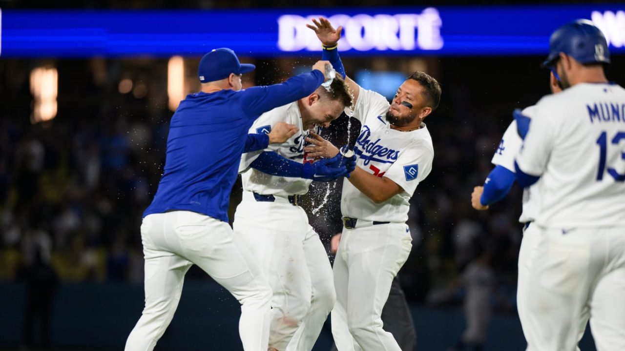 Dodgers Reach 60-Win Milestone in Dramatic Extra-Inning Victory
