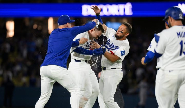 Dodgers Reach 60-Win Milestone in Dramatic Extra-Inning Victory