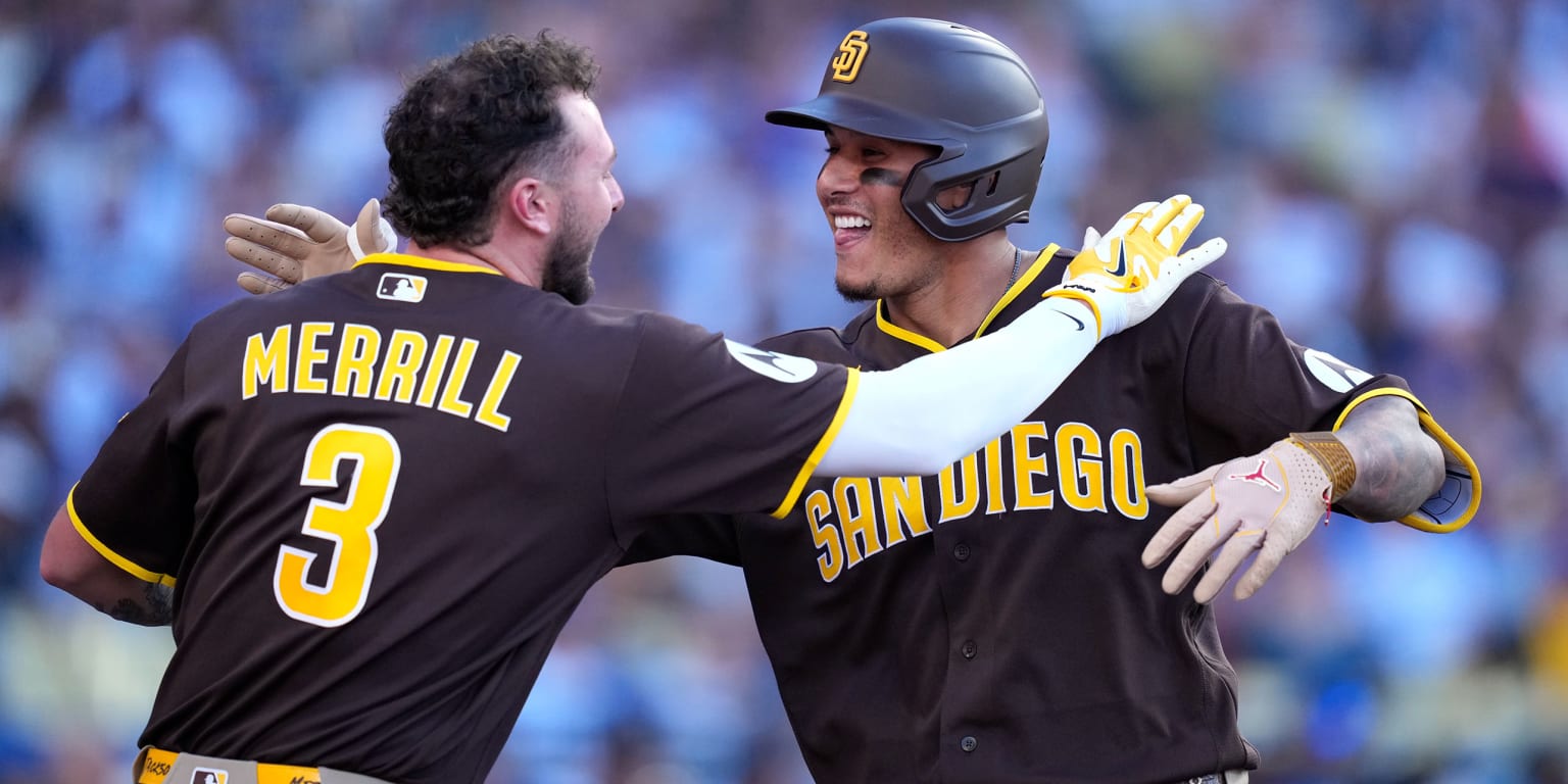 San Diego Padres' Manny Machado rounds the bases after hitting a home run.