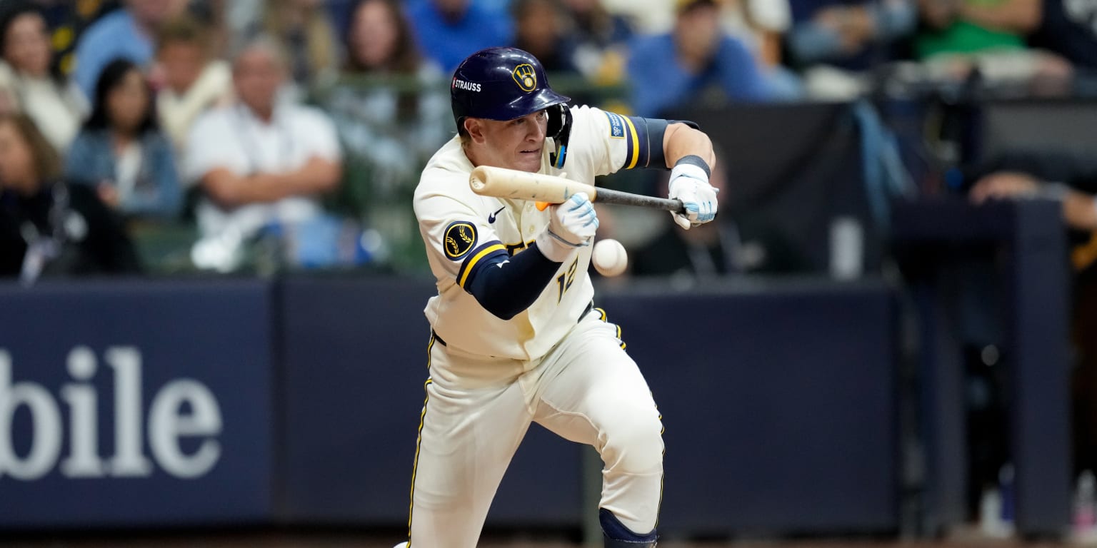 Milwaukee Brewers players celebrating a 2-1 victory against the Los Angeles Dodgers in Game 1 of the National League Championship Series at American Family Field.